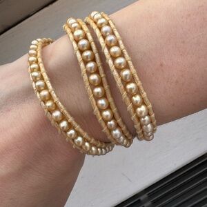 CHAN LUU PEARL AND GOLD BRAIDED BRACELET WITH SIGNATURE OVAL BUTTON CLASP